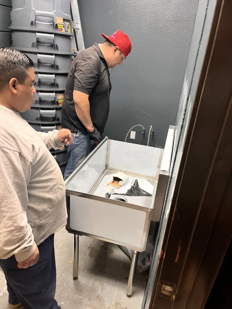 Commercial plumbing and sink installation in Aura